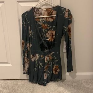 Brand new long sleeve romper teal with tan flowers